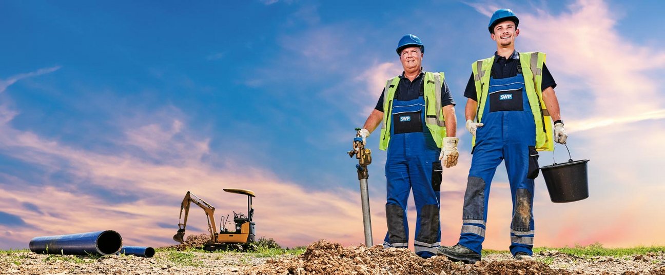Das Einstiegsbild zeigt unsere Netzkollegen vor einer Baustelle